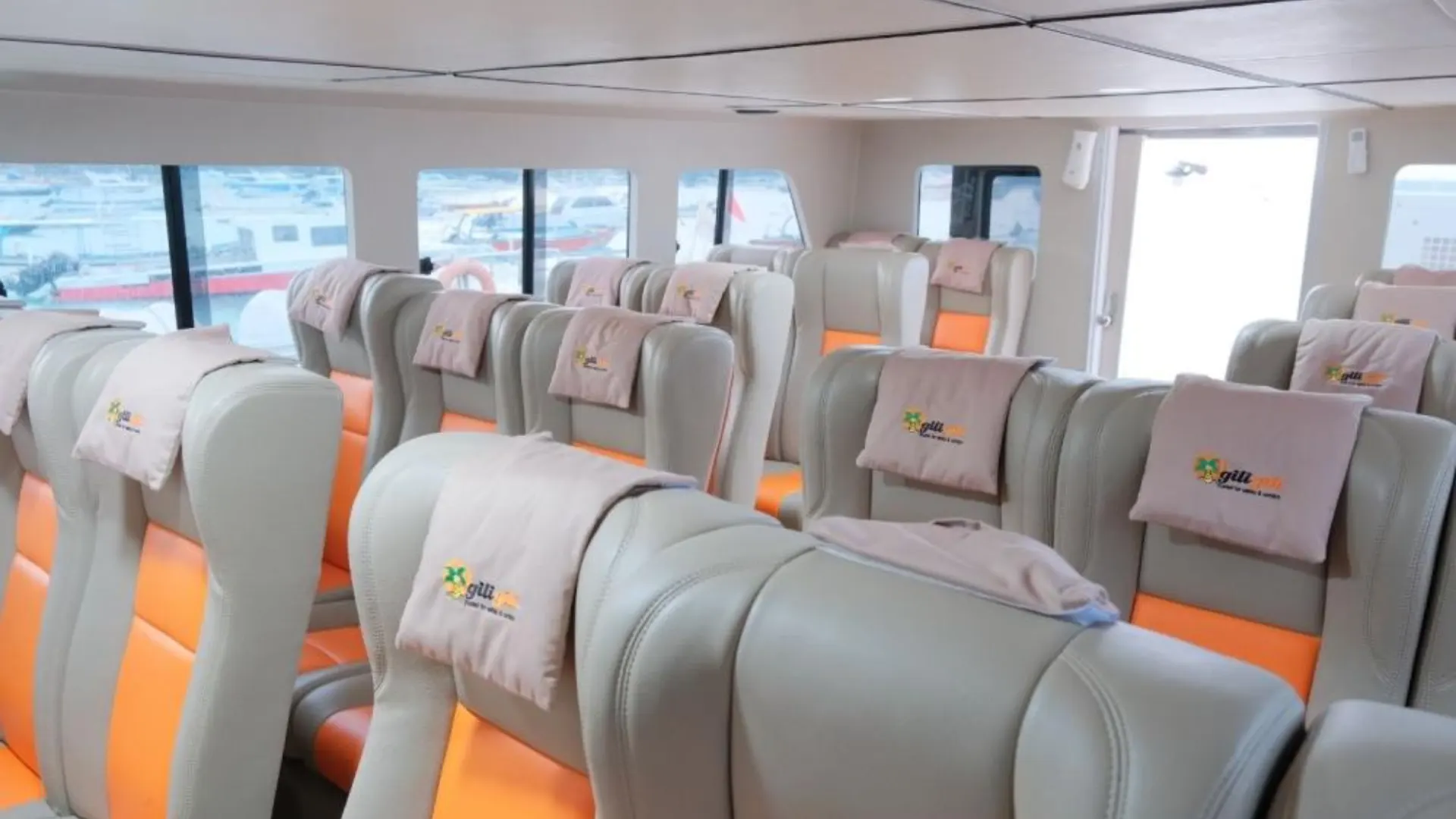 Air-conditioned main cabin on Gili Gili Fast Boat large vessel, premium forward seating for a relaxed Bali to Gili Islands cruise.