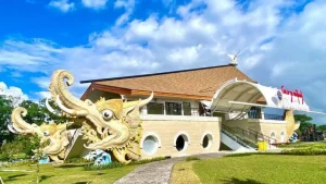 Main terminal of Sanur Harbor with Gajah Mina statue and escalators, efficient and comfortable passenger facilities.