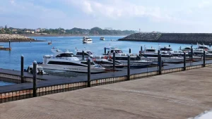 Modern fast boats docked at Sanur Fast Boat Harbor, main departure point for Fast Boat to Nusa Penida, Lembongan, and the Gili Islands.