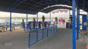 Close-up view of the fast boat boarding gate at Serangan Harbor, organized departure point for fast boat services.